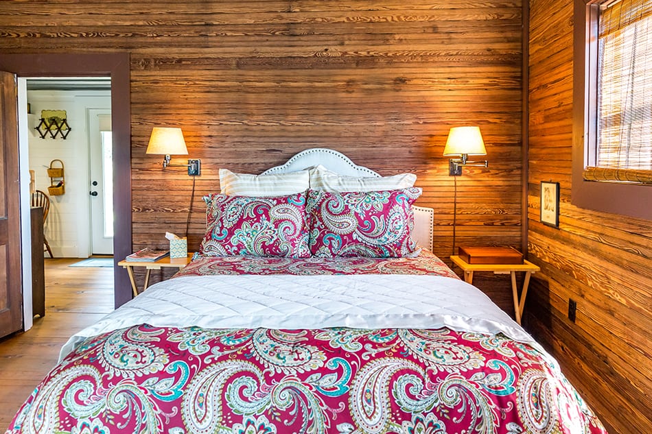 Distressed Wooden Wall Paneling in a Rustic Bedroom